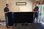 You'd be serious too if you were holding Sony's reference 85inch XBR LED TV