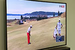 A curved Samsung 4K LED TV with a curved soundbar looks GREAT!