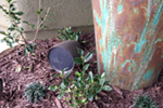 Episode landscape speakers hide very tastefully around the backyard.